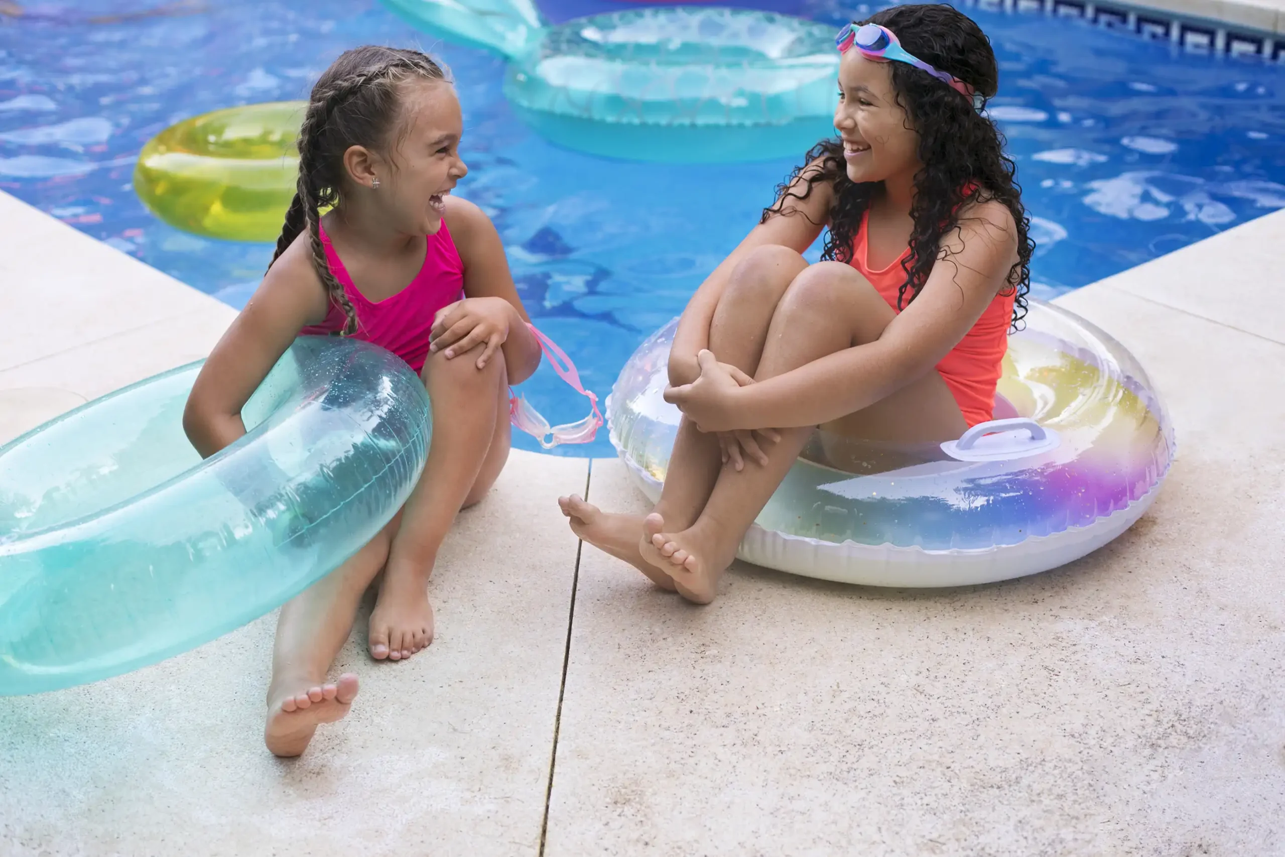 Home children having fun with floater pool